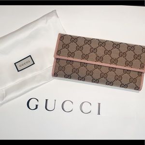 Pink trim GG Gucci wallet